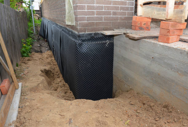 Happy homeowners after waterproofing job in Clarks Hill